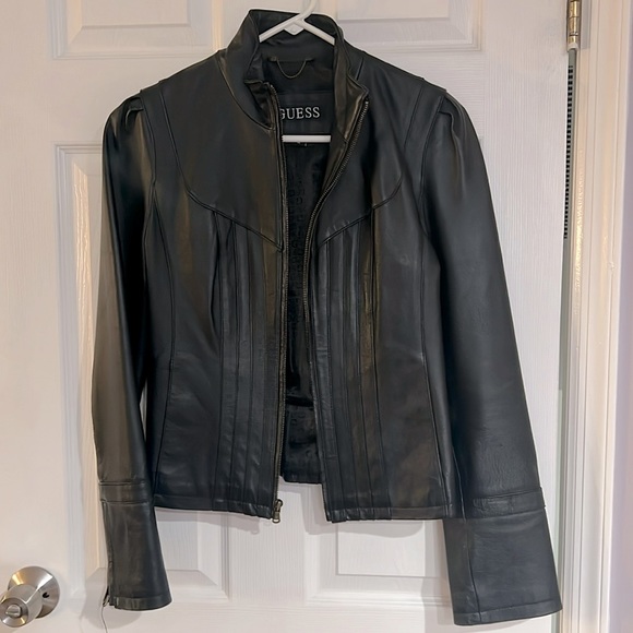 Guess Jackets & Blazers - Gently used Guess black leather jacket. Size M zippered sleeves